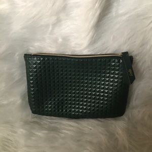 Green textured Ipsy Luxe makeup bag